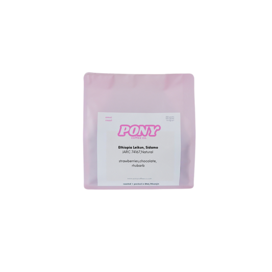 Pink retail bag of Ethiopian coffee beans